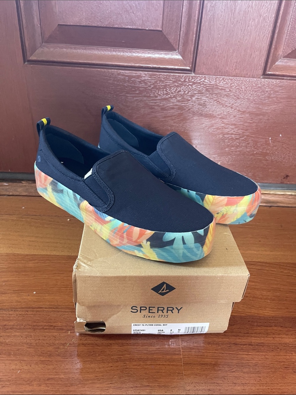 Sperry Black Slip-On Platform Sneakers with Multicolor Tropical Sole